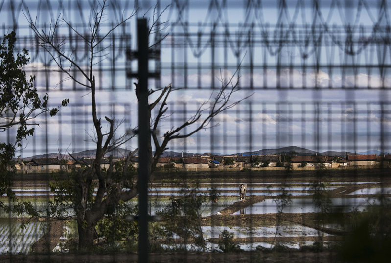 China North Korea border with fence