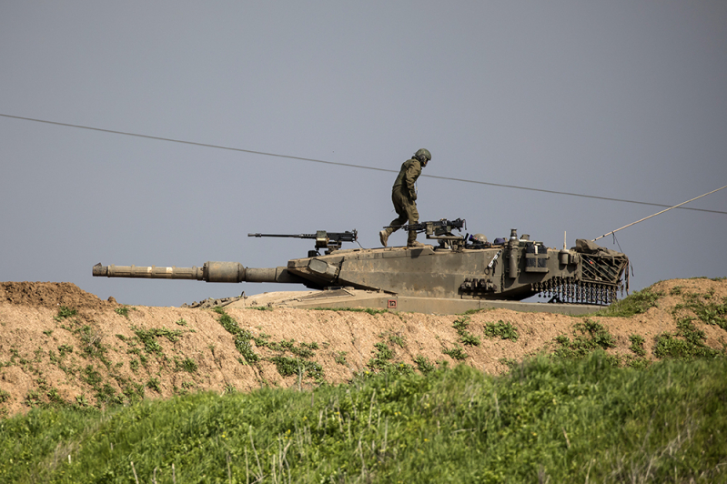 Israeli soldier on tank