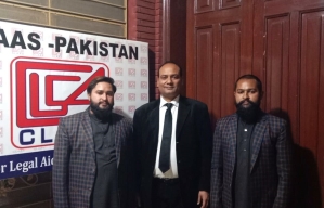 Attorney Tahir Bashir with Umair Saleem (L) and Umar Saleem (R) after their release on March 1, 2024. 