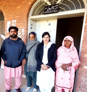 Sufyan Masih (L) with parents and attorney after a court hearing on May 18, 2024. 