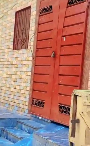 Locked door of one of the households who fled Christian Colony in Okara District, Pakistan after blasphemy accusation on June 23, 2024. 