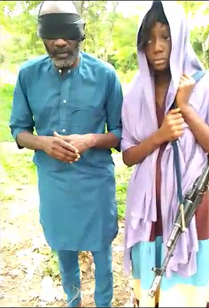 Pastor Isa Andrew and daughter Grace Isa Andrew, 13, in video appeal for ransom. 