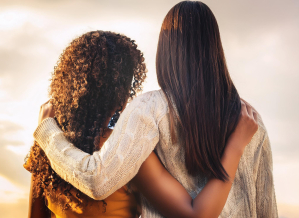 Two women supporting each other, comfort