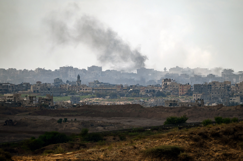 Smoke can be seen rising from an Israeli airstrike on Gaza from a viewpoint in Southern Israel on October 07, 2024 in Sderot, Israel