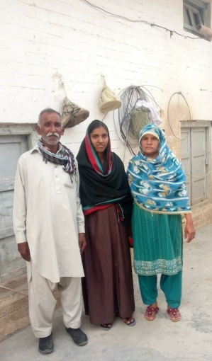 Sana Javed (center) with parents after rescue from forced conversion and marriage. 