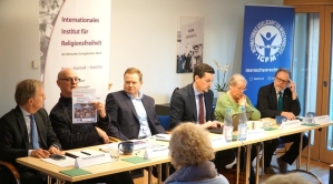 Human rights experts address launch of yearbooks at press conference in Berlin on Dec. 5, 2024. 