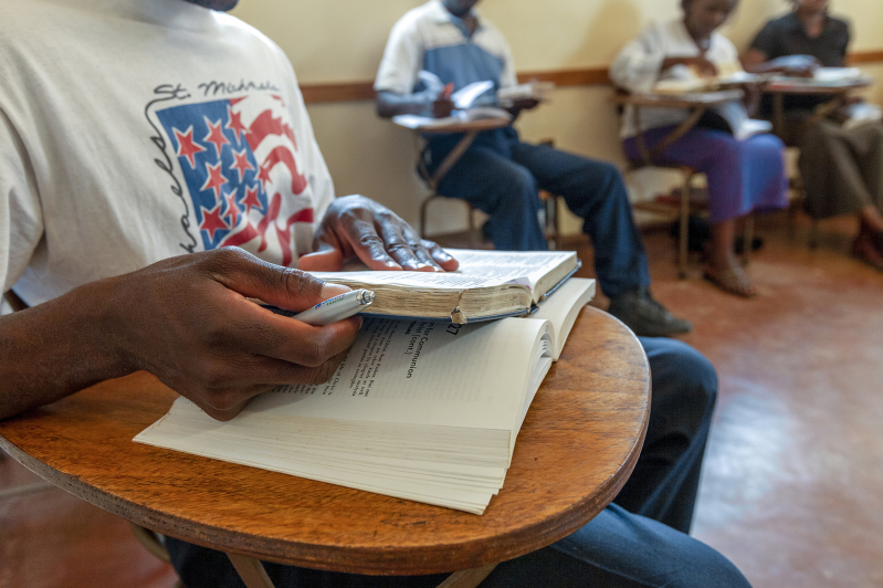 A seminary student studies his Bible in class at the Baptist Theological Seminary in Lusaka, Zambia