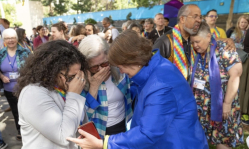 United Methodist Church drops decades-old ban on ordaining LGBT clergy without debate