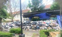Authorities accused of allowing garbage to pile up near church in Indonesia