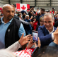Mark Carney emphasizes humility after Liberals win Canada's national election, takes strong stand against Trump
