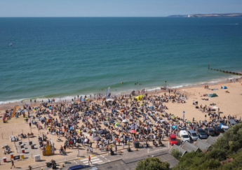 92 baptized in public mass ceremony on Bournemouth Beach, declaring faith in Jesus