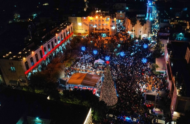 Bethlehem marks return of Christmas celebrations with packed tree lighting event