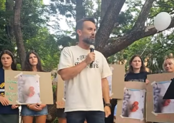 'Rally for Samuel' held in Brisbane after images allegedly show aborted boy dying while sucking his thumb