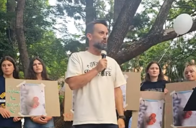 'Rally for Samuel' held in Brisbane after images allegedly show aborted boy dying while sucking his thumb