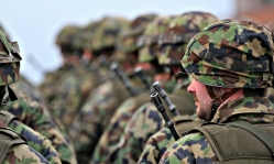 Swiss defence minister apologizes to churches for excluding them from clergy draft law change